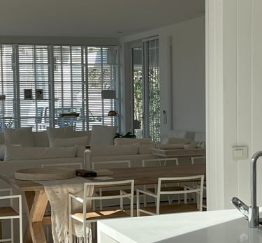 a kitchen with a sink, a sink, and a sink