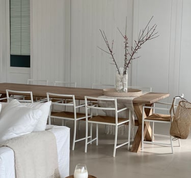 a living room with a couch and a table