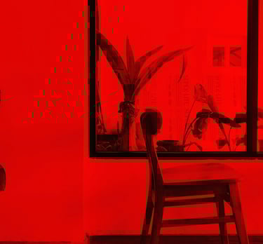 a chair in a room with red light