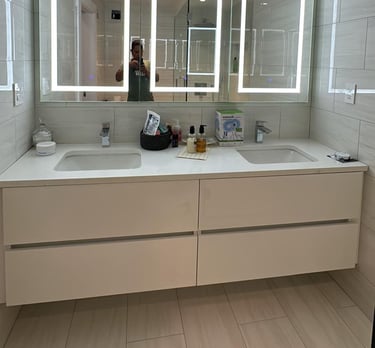a bathroom with a mirror and a mirror