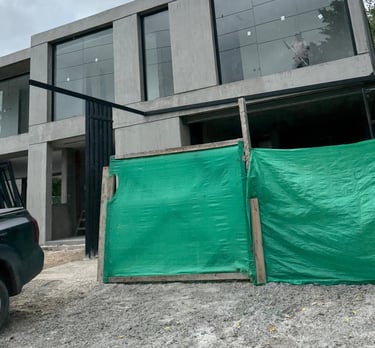 a house being built into a house with a pool and a pool