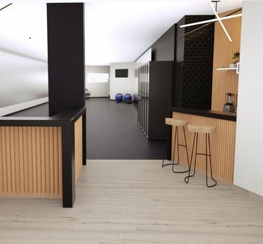 commercial gym interior with wood slat walls, a reception counter, juice bar, and workout equipment.