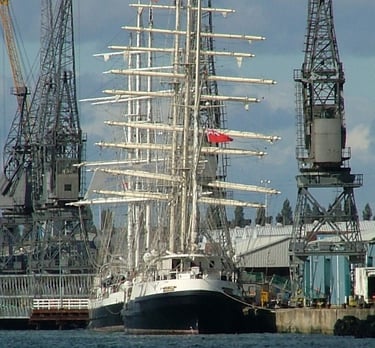 ©Nb"Sail Training Ship TENACIOUS". 2000 with sister ship. Berthed at Southampton Docks, West Quay..