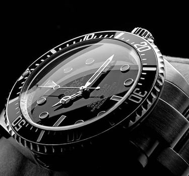 a watch with a black and white photo of a watch