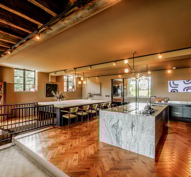 a kitchen with a marble counter top