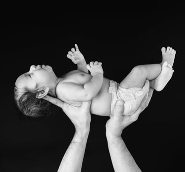 Close-up of tiny newborn feet captured in a heartwarming photography session.
