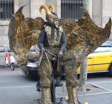 A street artist on Las Ramblas dressed as an alien