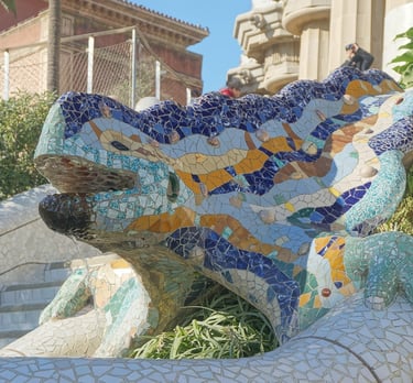Colourful mosaic lizard sculpture (El Drac) on the staircase at Park Güell