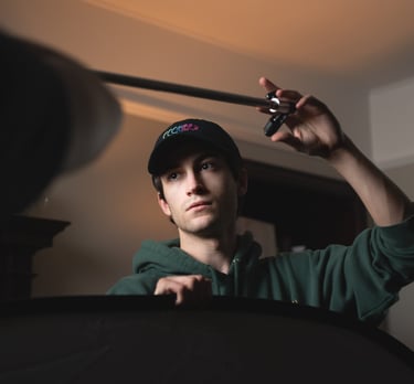 Film production services: person in a green shirt and baseball cap