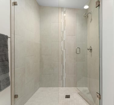 Modern frameless glass shower enclosure installed by FixShowers in an Auckland bathroom