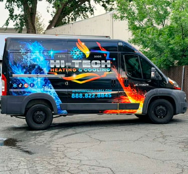 A Hi-Tech Heating and Cooling service van featuring fire and ice graphics for HVAC repair services.