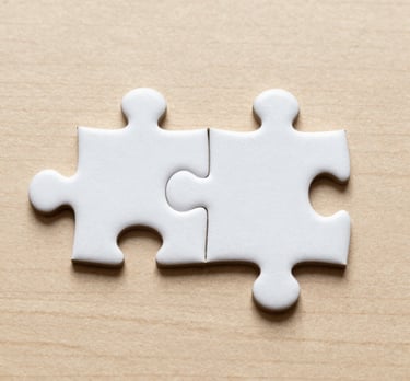 Close-up of legal documents and a pen on a wooden desk.