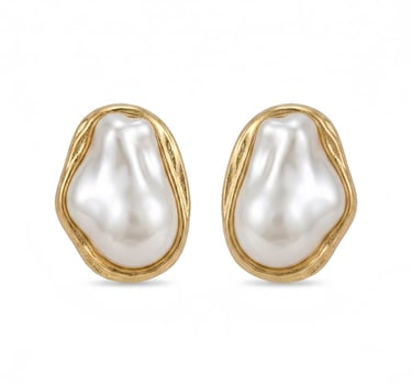 Elegant gold stud earrings featuring large baroque pearls in a textured organic frame.