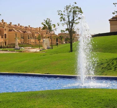 La Vista Egypt compound with water fountain, landscaped gardens and villas