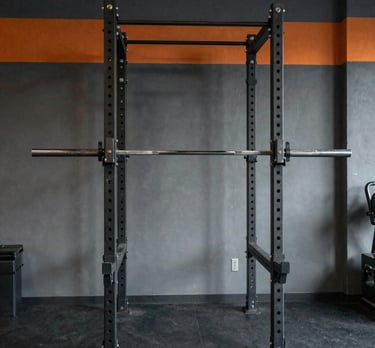 Bright, modern cardio machines lined up in a spacious gym with natural light.