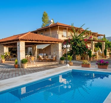 Mediterranean villa with swimming pool and a covered outdoor patio area.