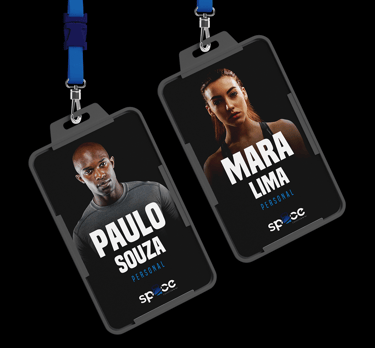 a pair of business badges on a black background with the visual identity of space crosstraining