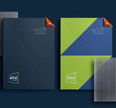 stationery folders with CTC Infra visual identity on a blue background