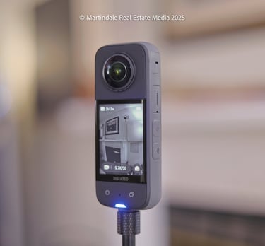 a camera with a camera attached to a monopod