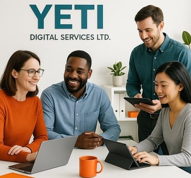 a group of people sitting around a table with a laptop and a laptop