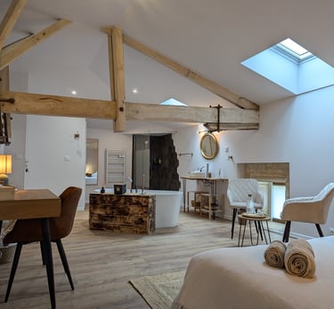 a bedroom with a bed, chair, and a desk