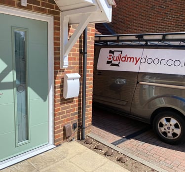 a chart well green front door with long glass panel and the buildmydoor van