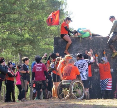 a woman in a wheelchair and a man in a wheelchair
