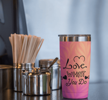 Pink tumbler with 'Love What You Do' quote – POD mockup