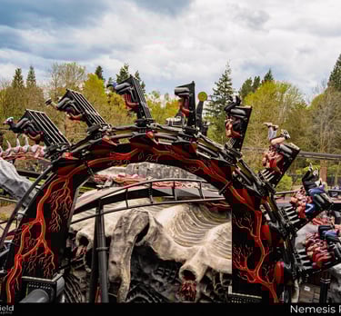 Roller Coaster in an inverted loop with people with legs in the air