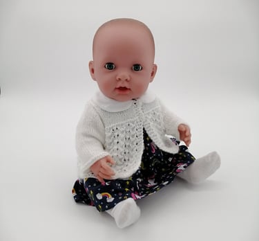 Missy Kissy baby doll in handmade dress and lacy cardigan
