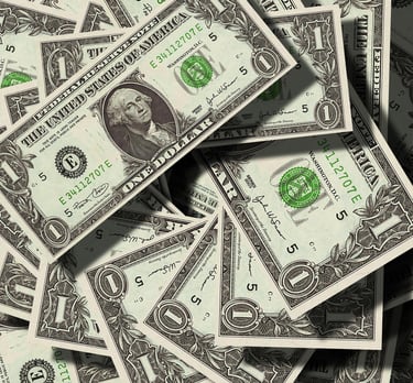 A stack of money to represent our commitment to cash offers, free from contingencies.
