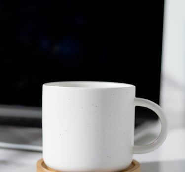 My Happy Place Crafts LLC | Plain, white, ceramic coffee mug next to laptop