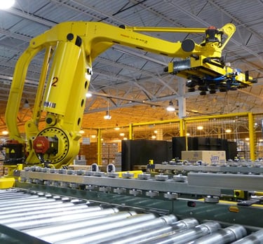 a space where there are industrial machines, with belts, couplings, bearings, industrial hoses