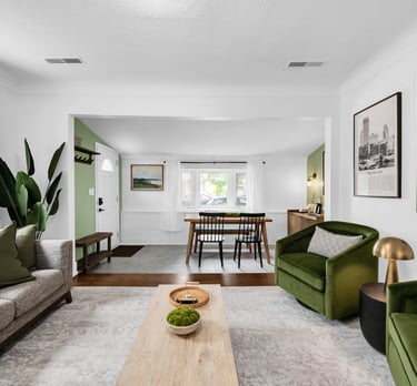 a living room with a couch and a table