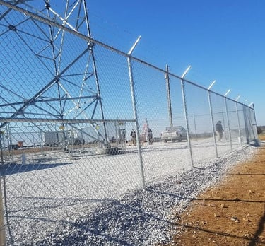 Commercial chain link fence with barbed wire installed for business security in Kentucky
