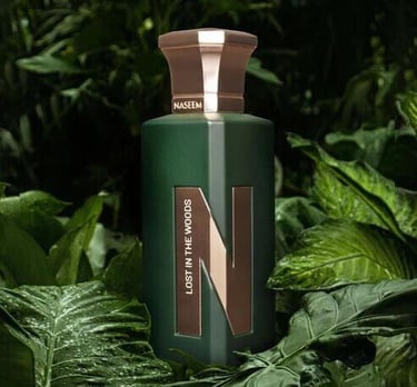 a bottle of Naseem Lost in the Wood perfume on a green leafy background