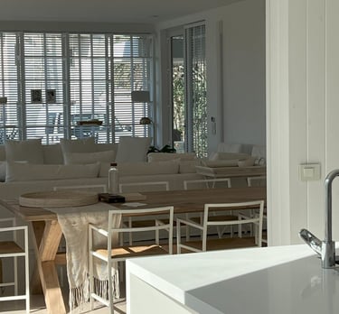 a kitchen with a sink, a sink, and a sink