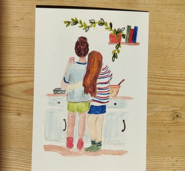a queer greetings card or print of a lesbian couple in the kitchen