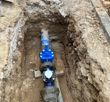 a blue pipe with a blue pipe in the middle of a pipe