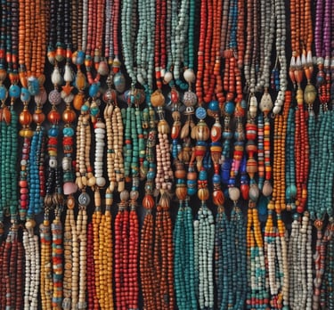 A collection of stylish accessories including a large handbag with a branded pattern, a pair of high-heeled shoes in a dark brown color, a floral scarf with vibrant colors, and a matching light pink clutch wallet. The background features a gradient of warm tones creating a fashionable and elegant display.