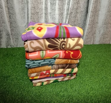 Wholesale premium fleece blankets by Rgl Textile Corporation, ideal for travel and NGO donations.
