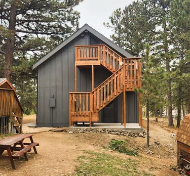 Finished garage build by Elk Valley Contractors featuring a modern exterior.