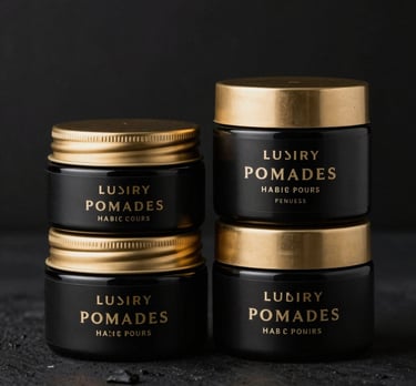 Close-up of premium men's pomade jars with elegant black and gold labels arranged on a sleek black surface.