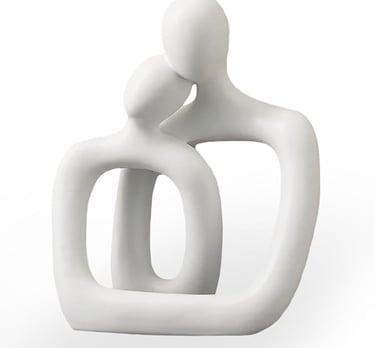 Minimalist lovers' statue as a meaningful bedroom statement decor piece.