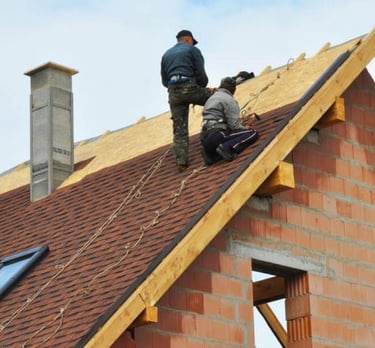 Tiling almost completed on one side of the new roof.