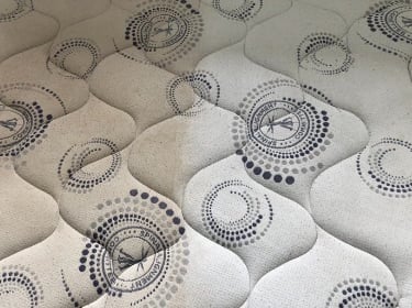 dirty mattress cleaned by professional mattress cleaner