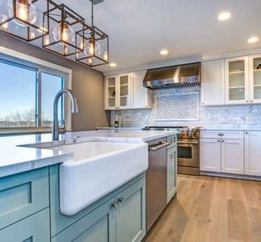 a kitchen with a sink and a large window