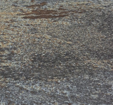 A soft stone slate with a rustic, weathered appearance, adding charm to any design project