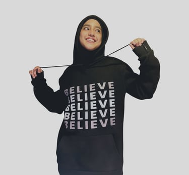 a woman in a black hoodie with a black hoodie and a black hood