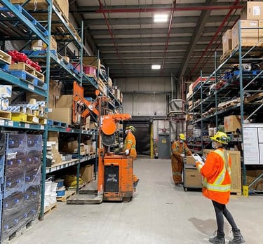  standing in a warehouse